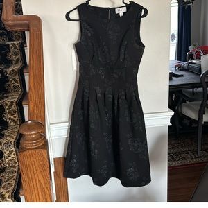 Worn once, Elle size 2 fit and flare black embroidered dress.